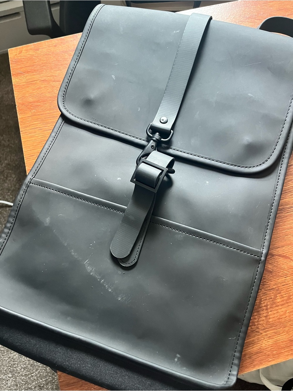 Rains Black Waterproof Roll-Top Backpack - Minimalist Design